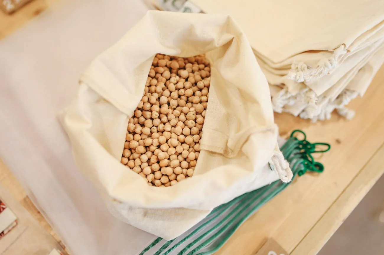 Soybean seeds in a wooden scoop
